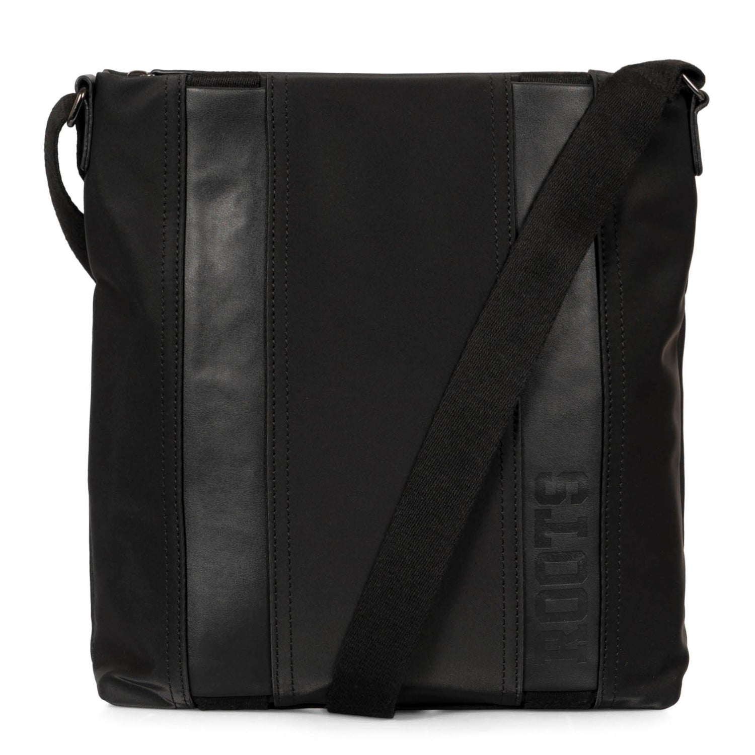 Front side of a black men's crossbody bag called Dilan designed by Roots showing its strap, logo, and texture contrast.