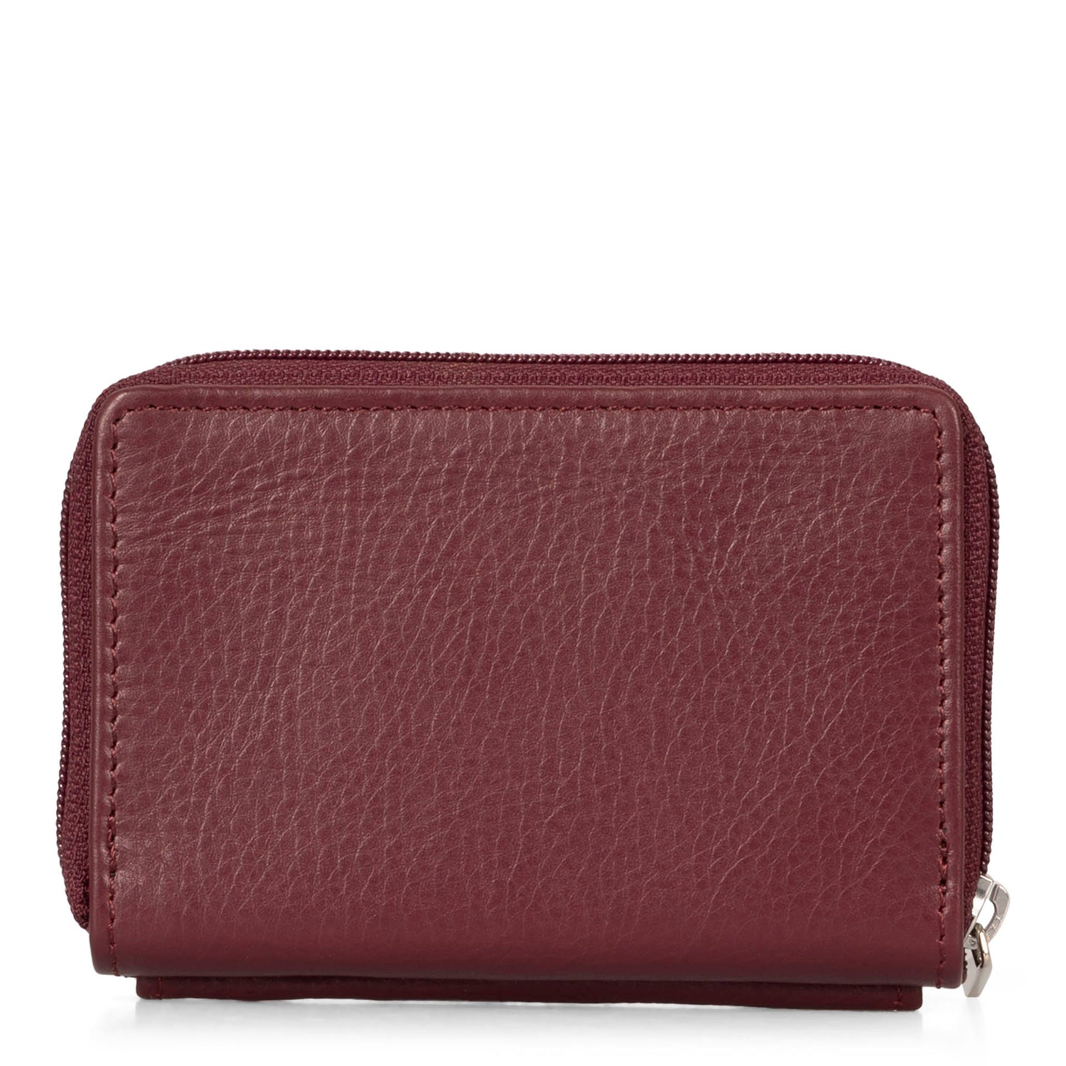 Back side of a burgundy card holder called basics by tracker, showing its soft leather texture.