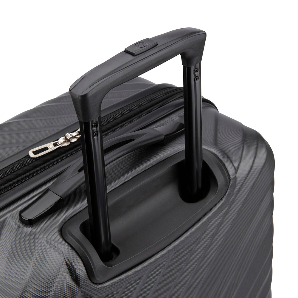 Close side view of a black hard side luggage called MOD designed by Swiss Gear sold at Bentley, showcasing its telescopic handle.